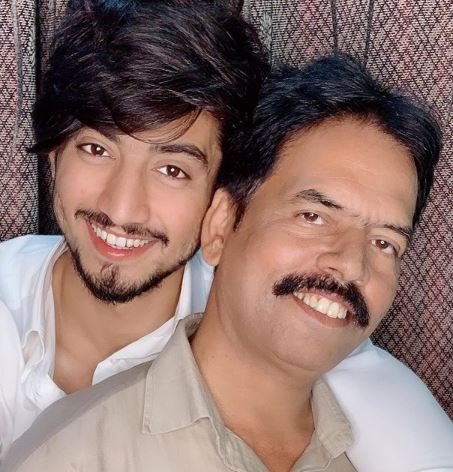 Faisal with his father